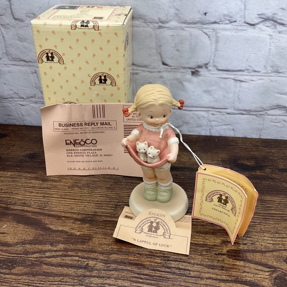 1990 Enesco Memories of Yesterday 525014 "A lap full of luck" figurine